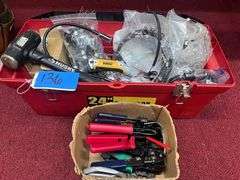 Toolbox with various tools and wire (under table)