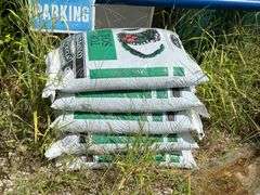 Bins with dirt/top soil/bags of mulch