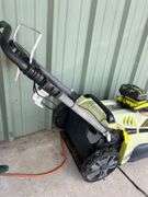 Ryobi Battery Powered lawn Mower with batteries and charger