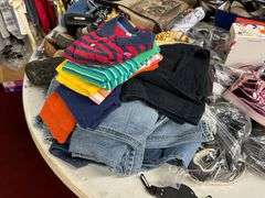 Large Lot:  ALL clothes/ALL shoes, (2) rolling clothes racks and table