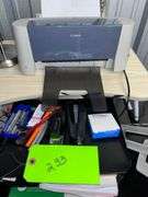 Table with all contents: Office Equipment, (2) Printers, (2) label printers/Monitor/Keyboard
