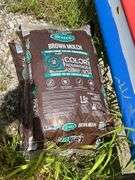 Bins with dirt/top soil/bags of mulch