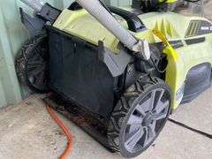 Ryobi Battery Powered lawn Mower with batteries and charger