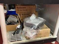 (2) Shelves with all contents:  Work light, retractable cord reels, misc parts