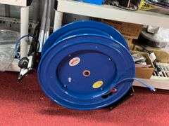 (2) Shelves with all contents:  Work light, retractable cord reels, misc parts