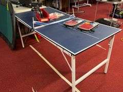 Ping Pong table with paddles