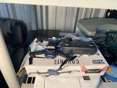 Samsung 63" TV (Works), Plastic shelf with all contents: Samsonite luggage, drone, keyboard