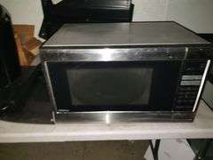 Table: George Foreman air fryer, Keurig coffee maker, Panasonic Microwave, desk/chair with all contents