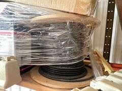 Pallet:  Phone, Large Plastic reel, reels of cable, adaptors