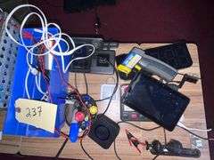 Rolling work table with charging cords/clock infrared Thermometer