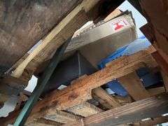Spring driven air hose and (2) pallets of misc (Note on top shelf and buyer must remove)