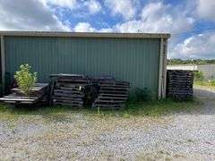 All Outdoor pallets behind building