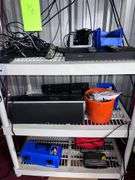 Plastic shelf with all electronic equipment on it