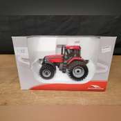2) 1/32 McCormick Tractors NIB UH - Aumann Auctions, Inc.