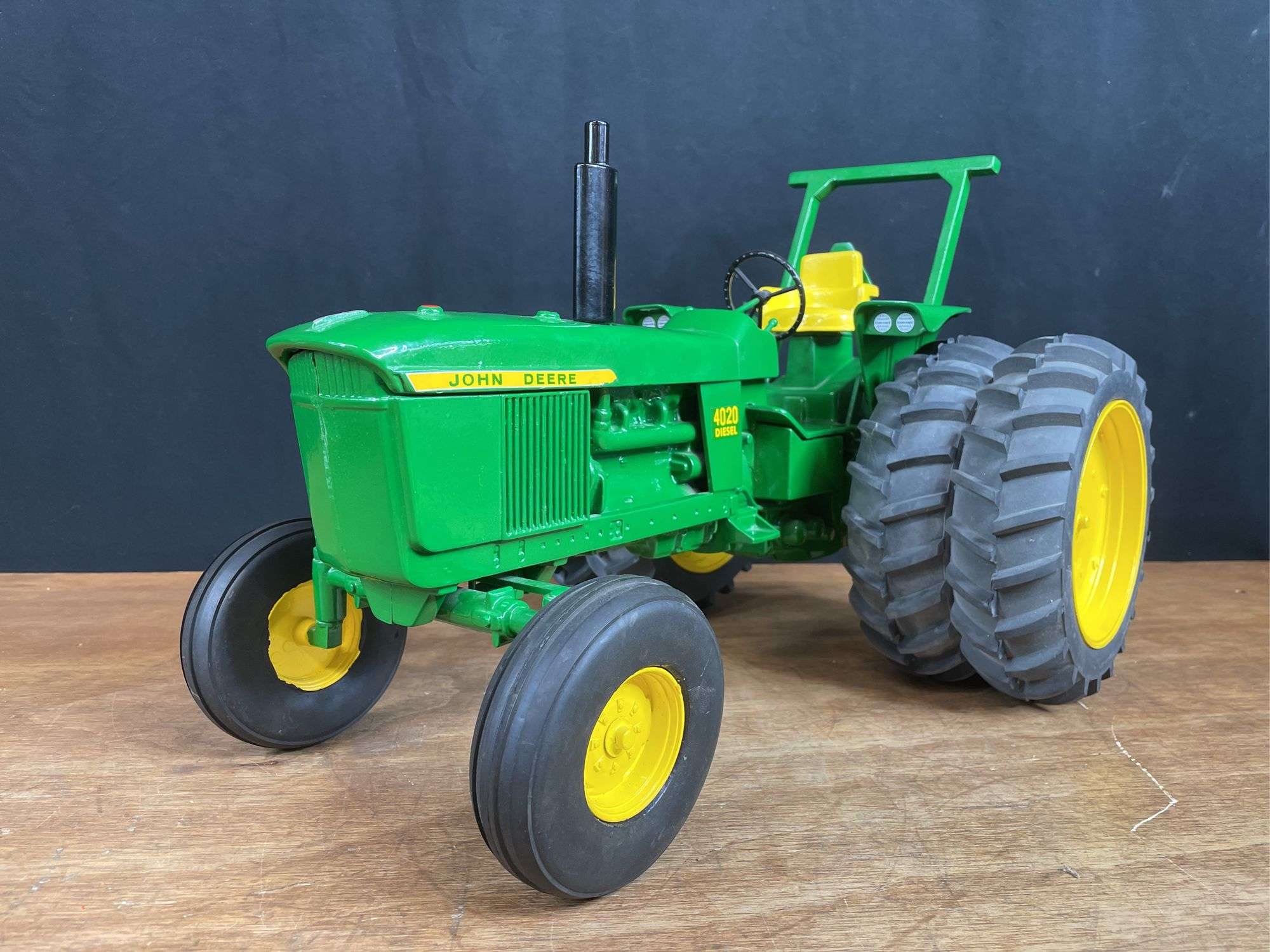 1/8 John Deere 4020 SM - Aumann Auctions, Inc.