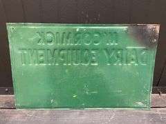 IH McCormick Dairy Equipment SST Sign