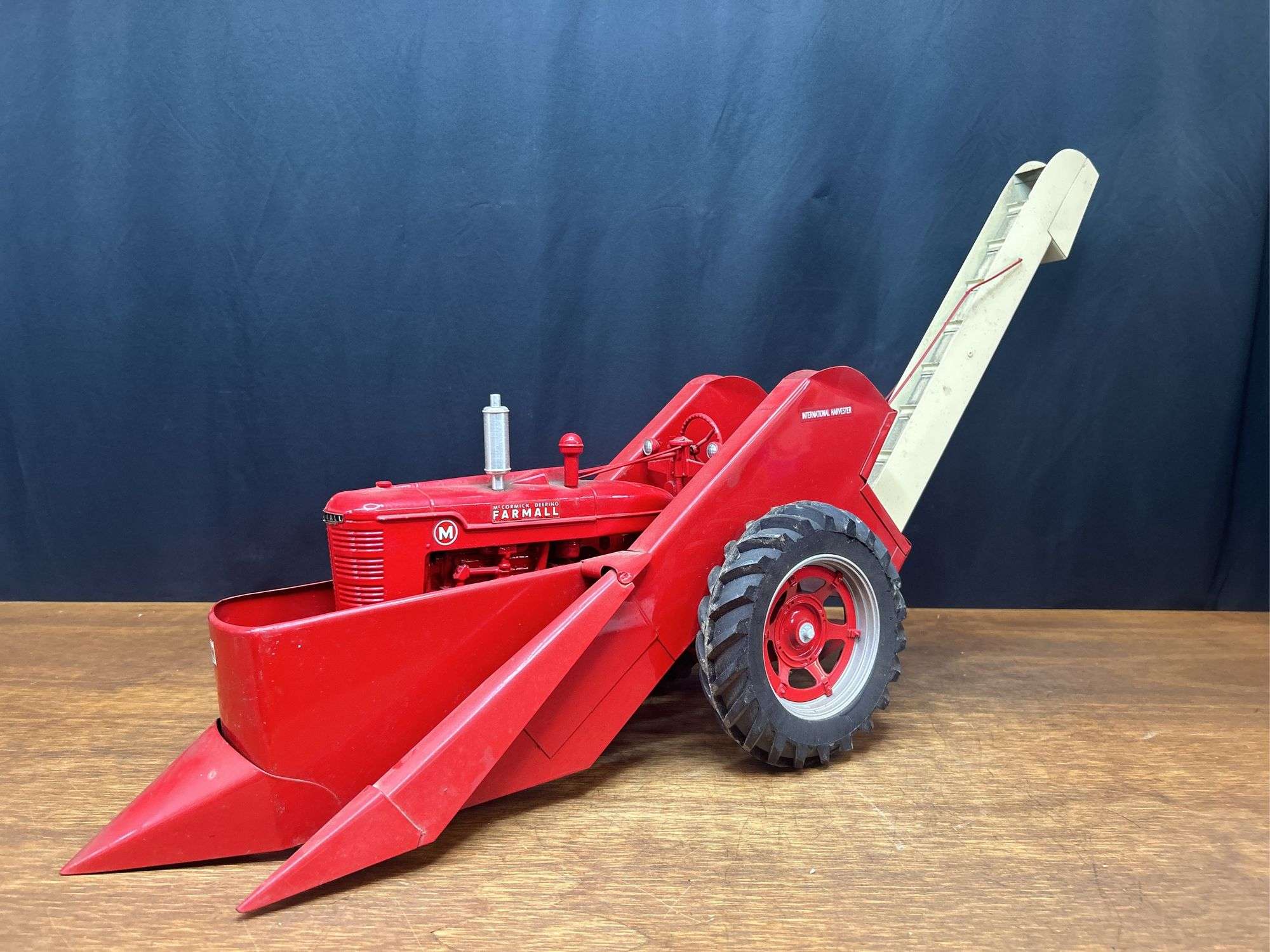 1/8 Farmall M w/Corn Picker - Aumann Auctions, Inc.