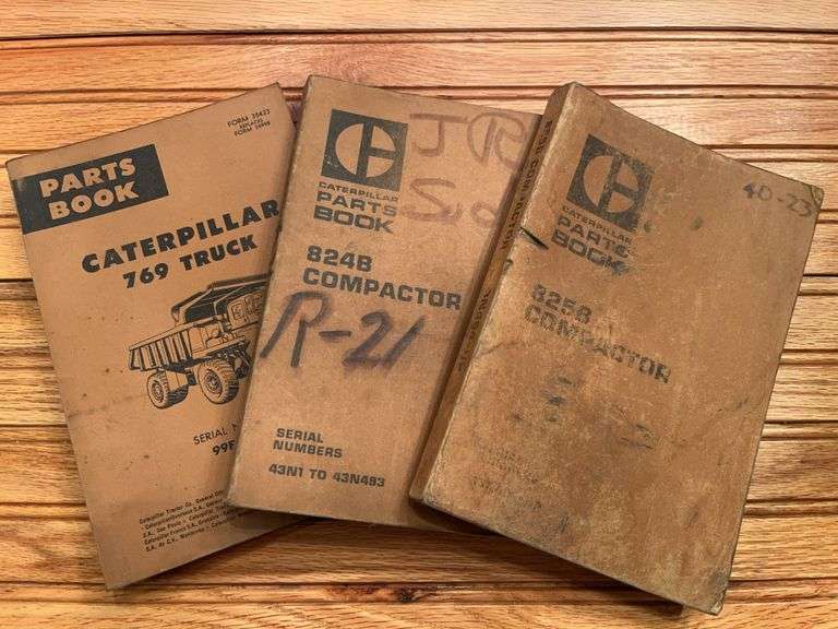 (3) Caterpillar Truck + Compactor Manuals image