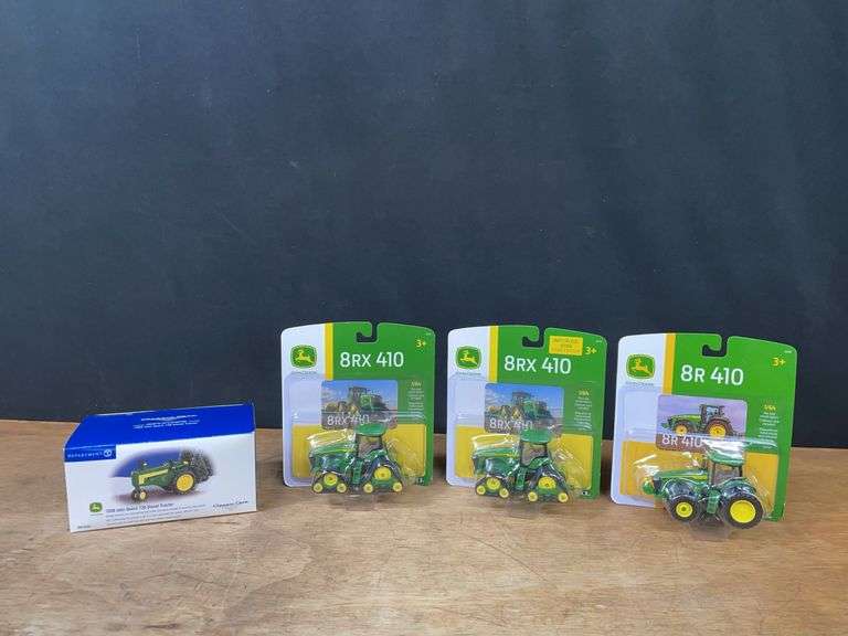 (4) John Deere Tractors NIB image