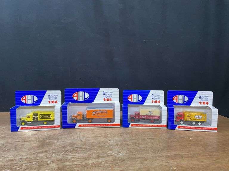 (4) 1/64 Trucks NIB image