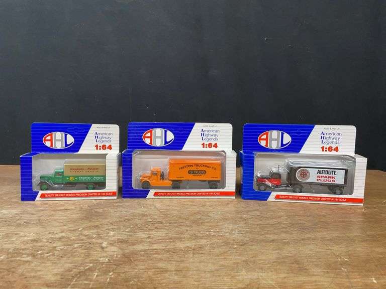 (3) 1/64 Trucks NIB image