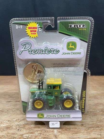1/64 John Deere 7020 Muddy Premier NIB Ertl image