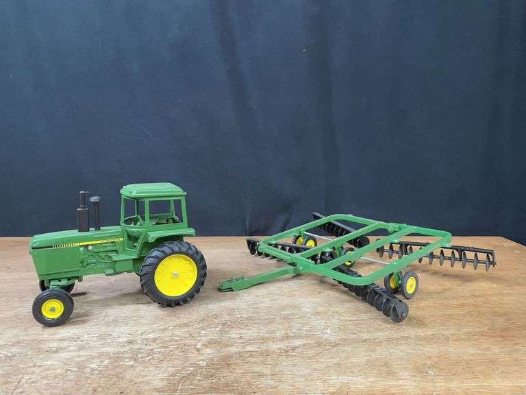(2) 1/16 John Deere 4450 + 220 Disk Ertl image