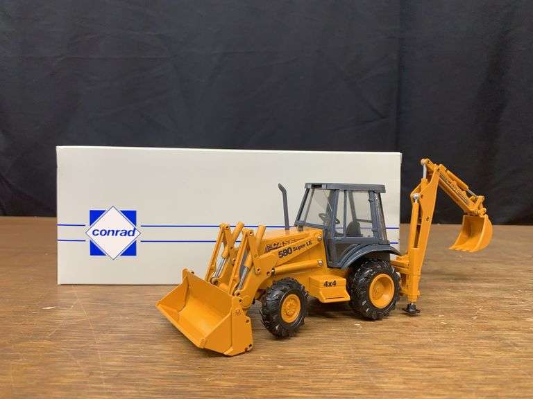 1/25 Case 580 Super E Backhoe NIB Conrad image
