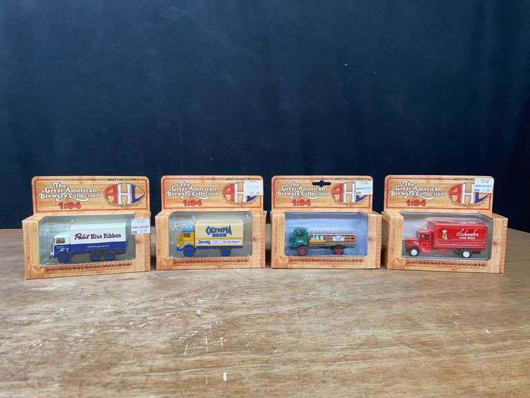 (4) 1/64 Trucks NIB image