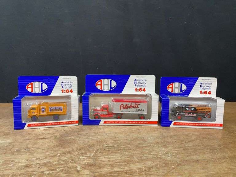 (3) 1/64 Trucks NIB image