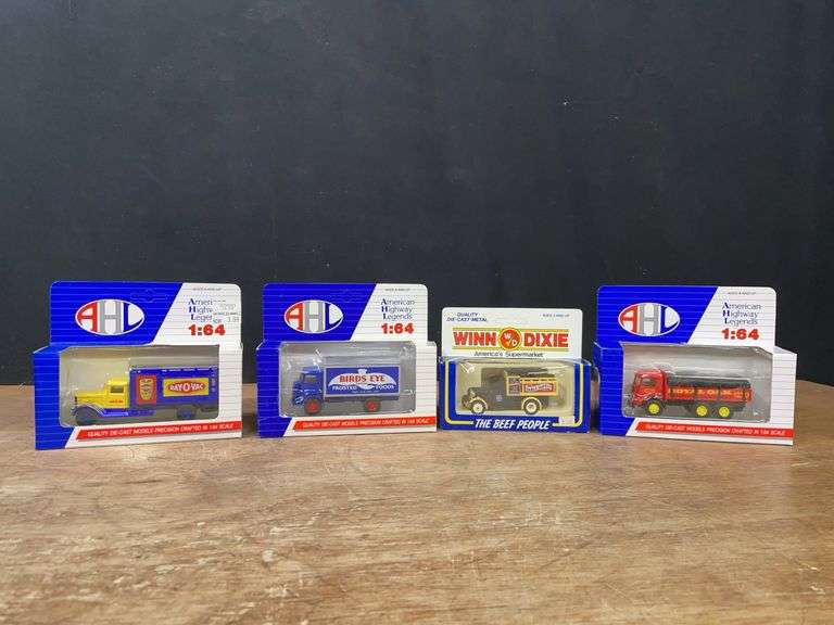 (4) 1/64 Trucks NIB image
