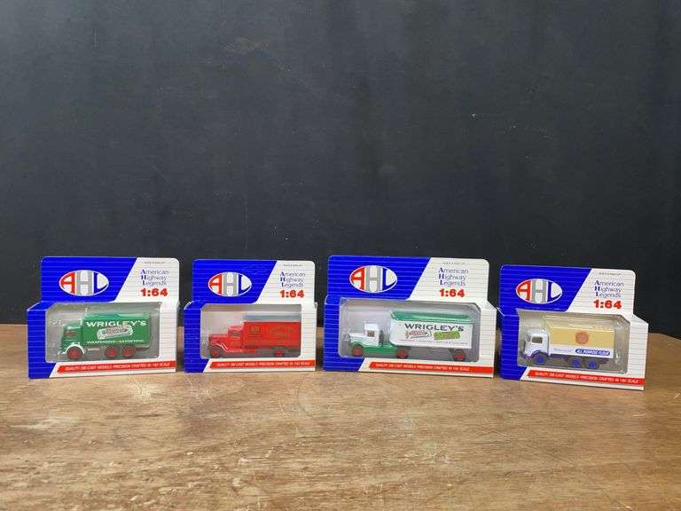 (4) 1/64 Trucks NIB image