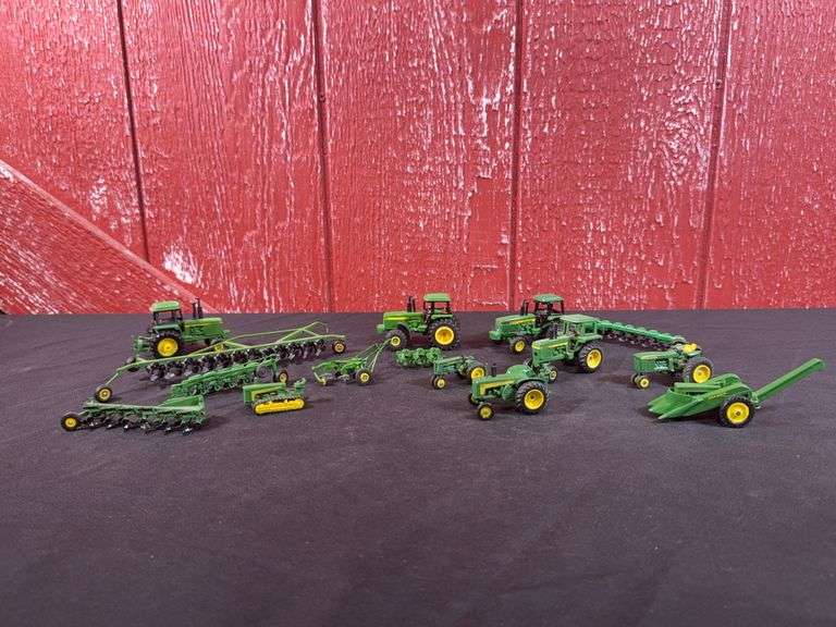 (15) 1/64 John Deere Tractors + Plows image