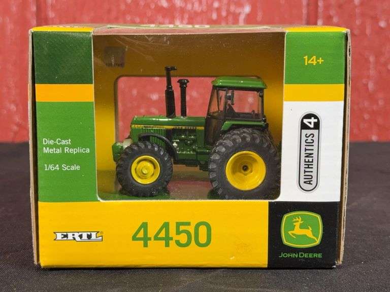 1/64 John Deere 4450 Authentics NIB Ertl image