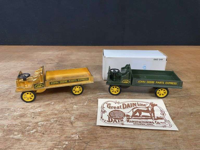 (2) John Deere Dain Trucks image