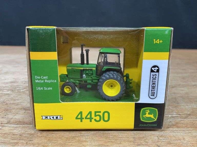1/64 John Deere 4450 Authentics NIB Ertl image