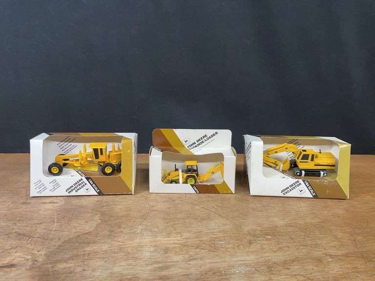 (3) 1/64 John Deere Industrial NIB Ertl image