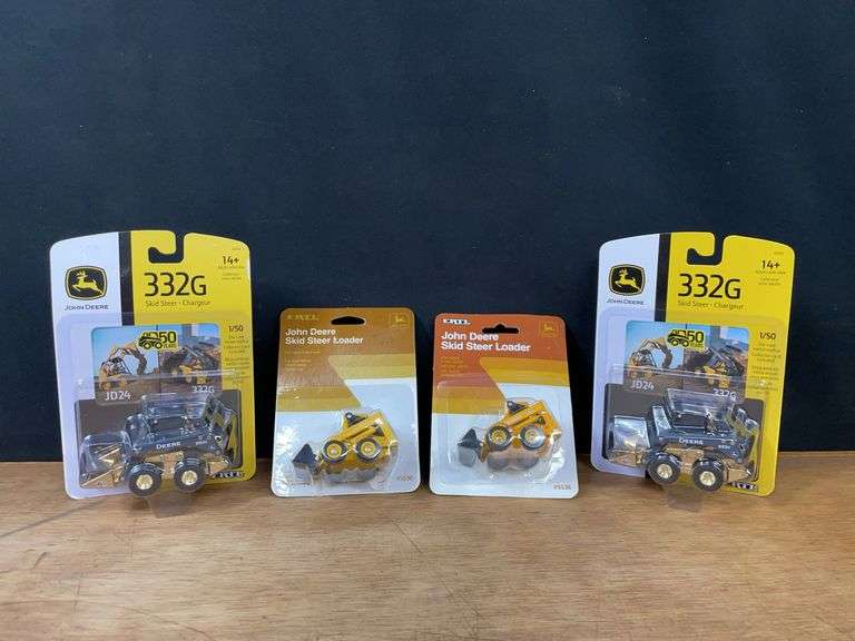 (4) 1/50 + 1/64 John Deere Skid Loaders NIB Ertl image