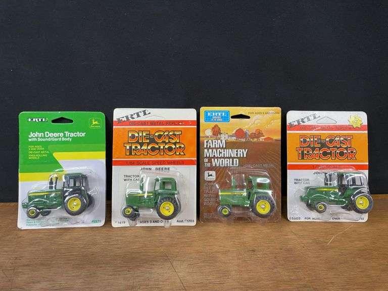 (4) 1/64 John Deere Tractors NIB Ertl image