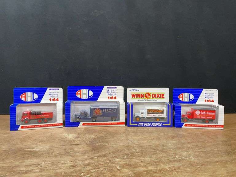 (4) 1/64 Trucks NIB image