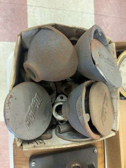 Assortment of Maytag Mufflers and Brackets image