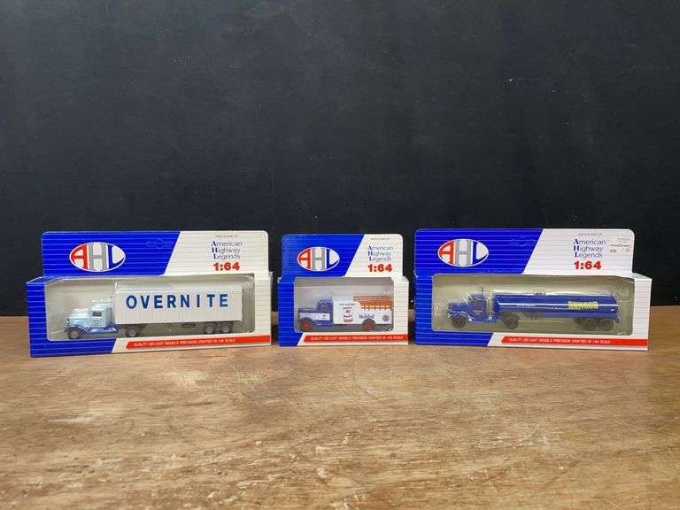 (3) 1/64 Trucks NIB image