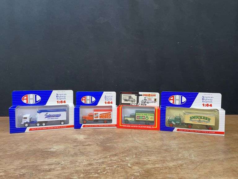 (4) 1/64 Trucks NIB image