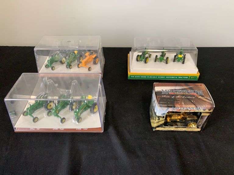 (4) 1/64 John Deere Tractors image
