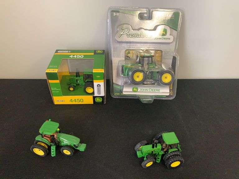 (4) 1/64 John Deere Tractors Ertl image