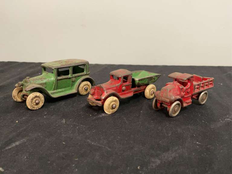 (3) Cast Iron Trucks + Car image