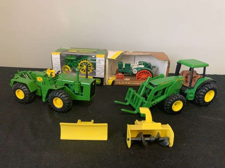 (4) 1/32 John Deere Tractors image