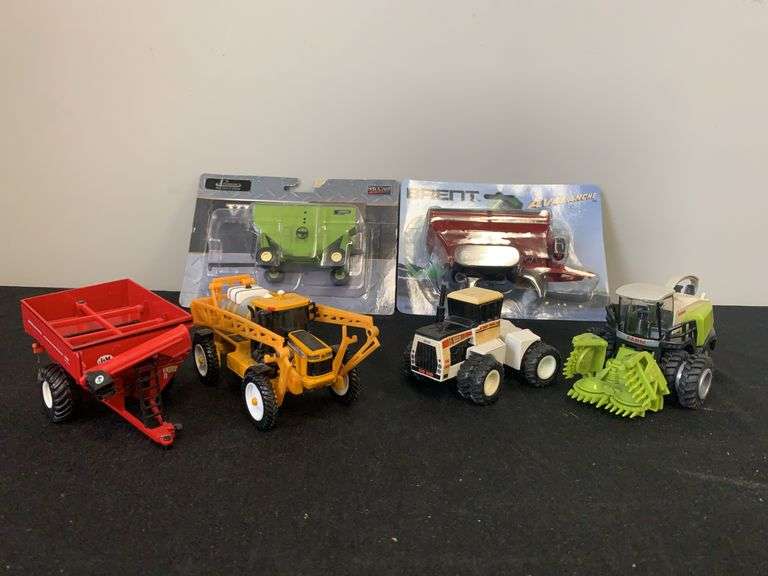 (6) 1/64 Tractors, Forage Harvester, Sprayer, Wagons image