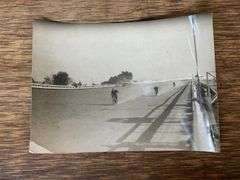 (2) Motorcycle Racing Photos