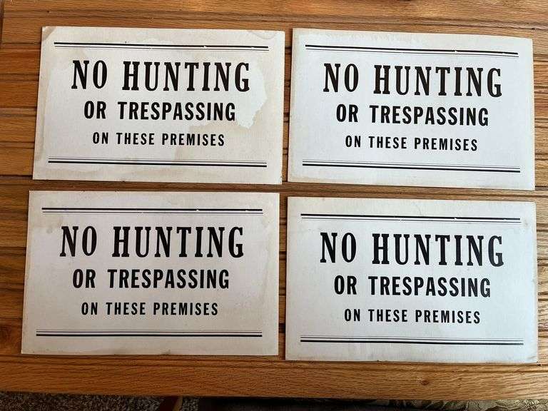 (4) No Hunting + Trespassing Signs image